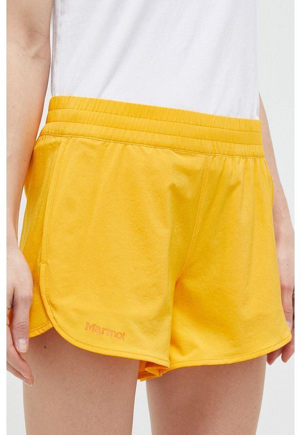 Marmot szorty outdoorowe Elda kolor pomarańczowy gładkie medium waist. Kolor: pomarańczowy. Materiał: tkanina, włókno, materiał. Wzór: gładki