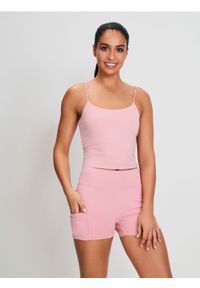 Sinsay - Dopasowane szorty sportowe Gym Hard - różowy. Kolor: różowy. Styl: sportowy