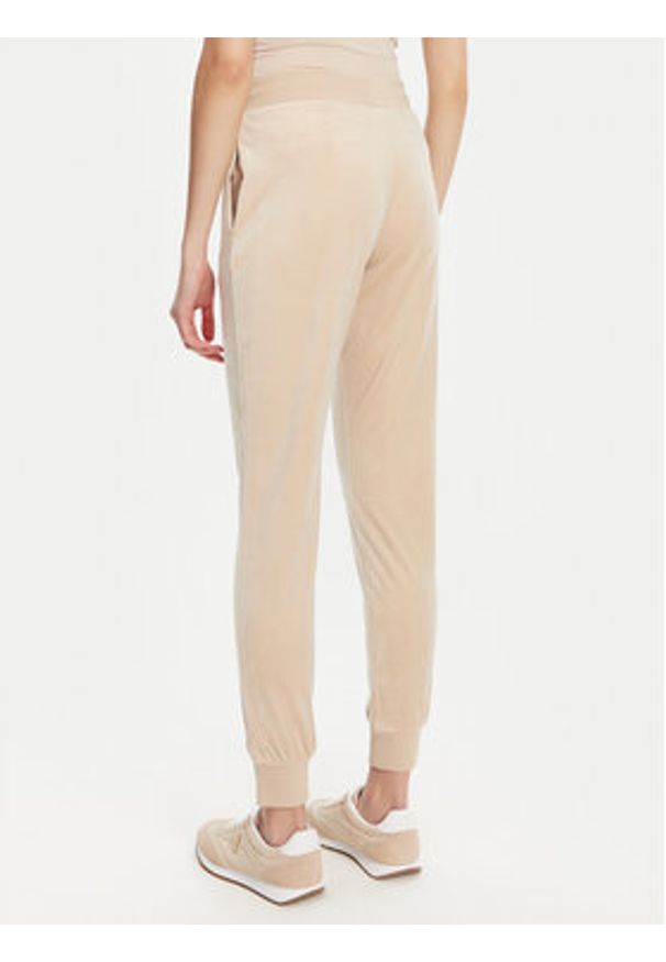 Guess Spodnie dresowe V3BB27 K0232 Beżowy Regular Fit. Kolor: beżowy. Materiał: syntetyk