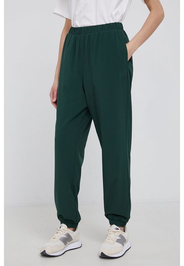 GAP Spodnie dwustronne damskie kolor zielony joggery medium waist. Kolor: zielony. Materiał: materiał