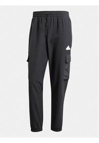 Adidas - adidas Spodnie dresowe City Escape IR5179 Czarny Regular Fit. Kolor: czarny. Materiał: syntetyk #4