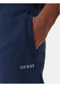 Guess Spodnie dresowe Z6RB12 KAIJ1 Granatowy Regular Fit. Kolor: niebieski. Materiał: bawełna #2
