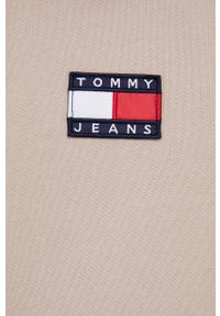 Tommy Jeans Bluza bawełniana DM0DM11798.4890 męska z kapturem gładka. Typ kołnierza: kaptur. Kolor: beżowy. Materiał: bawełna. Wzór: gładki, aplikacja #2