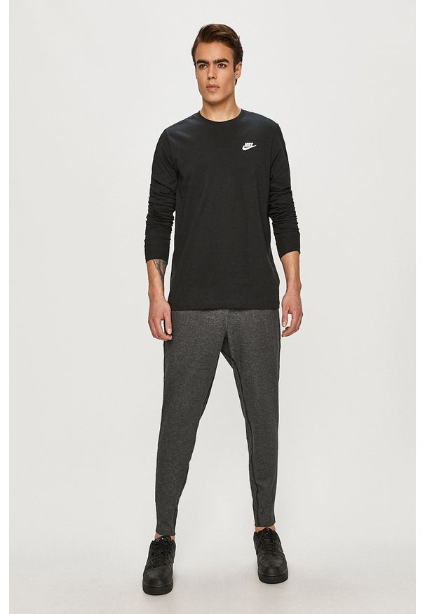 Nike - Spodnie. Kolor: szary. Materiał: dzianina, materiał, włókno
