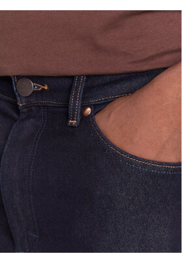 Wrangler Jeansy Wrancher 112373029 Granatowy Bootcut Fit. Kolor: niebieski
