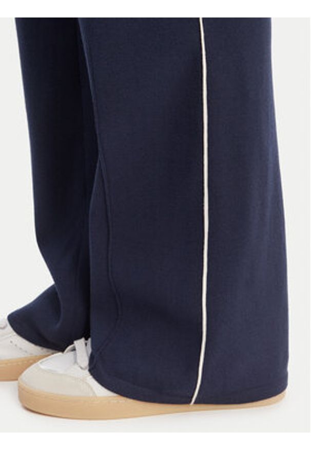 Guess Spodnie dzianinowe V6RB14 Z4642 Granatowy Regular Fit. Kolor: niebieski. Materiał: syntetyk
