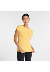 Koszulka damska New Balance WT51223CEE – żółta. Kolor: żółty. Materiał: tkanina, poliester, materiał #1