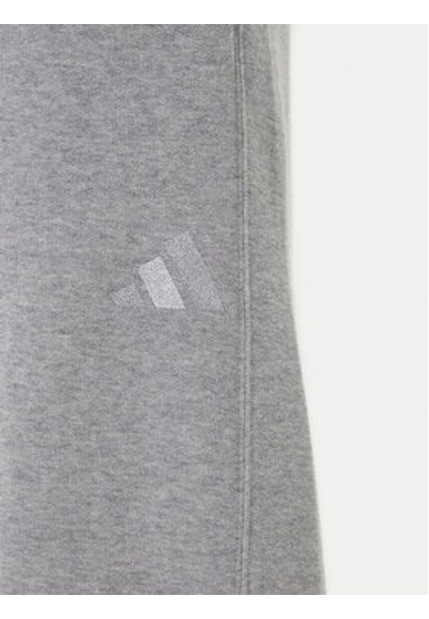 Adidas - adidas Spodnie dresowe ALL SZN Holiday Glitter Fleece JV5758 Szary Loose Fit. Kolor: szary. Materiał: bawełna