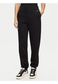 Calvin Klein Spodnie dresowe K20K208330 Czarny Relaxed Fit. Kolor: czarny. Materiał: bawełna #1