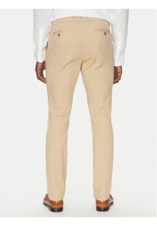 Michael Kors Chinosy CS4301KDR2 Beżowy Slim Fit. Kolor: beżowy. Materiał: bawełna