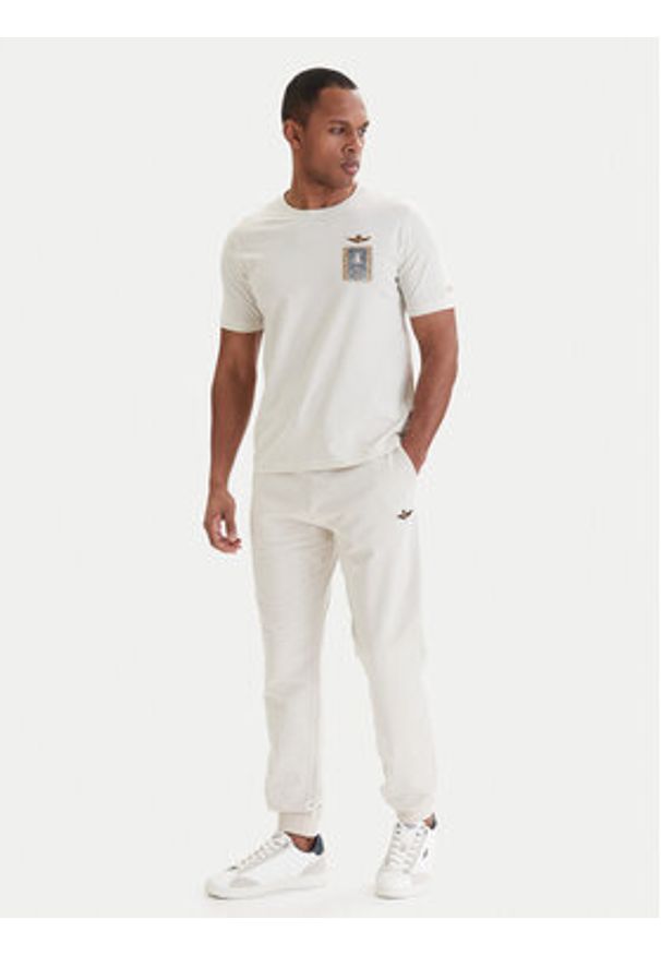 Aeronautica Militare Spodnie dresowe 261PF1008UF00674 Beżowy Regular Fit. Kolor: beżowy. Materiał: bawełna