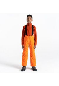 DARE 2B - Spodnie narciarskie dla dzieci Dare2Be Outmove II ARED 20/30. Kolor: pomarańczowy. Materiał: poliester. Sezon: zima. Sport: narciarstwo #1