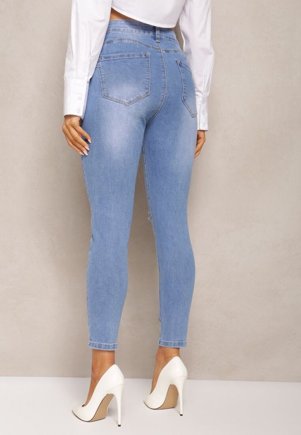 Renee - Niebieskie Jeansy o Fasonie Skinny Push Up z Przedarciami Fanfa. Kolor: niebieski