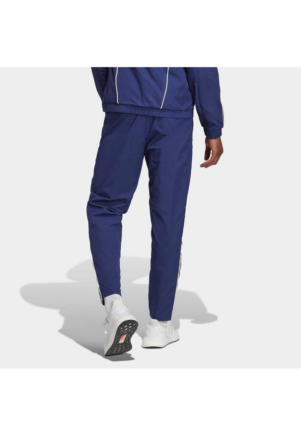 Spodnie Adidas Włochy Figc Pre Pnt Dorosłych. Kolor: niebieski. Materiał: poliamid