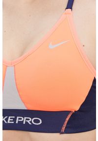 Nike - Biustonosz sportowy Indy. Kolor: pomarańczowy #2