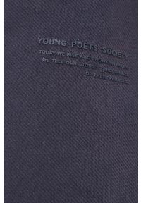 Young Poets Society Spodnie męskie kolor granatowy gładkie. Kolor: niebieski. Materiał: dzianina. Wzór: gładki