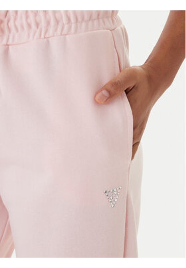 Guess Spodnie dresowe V6GB11 K3095 Różowy Regular Fit. Kolor: różowy. Materiał: syntetyk, bawełna
