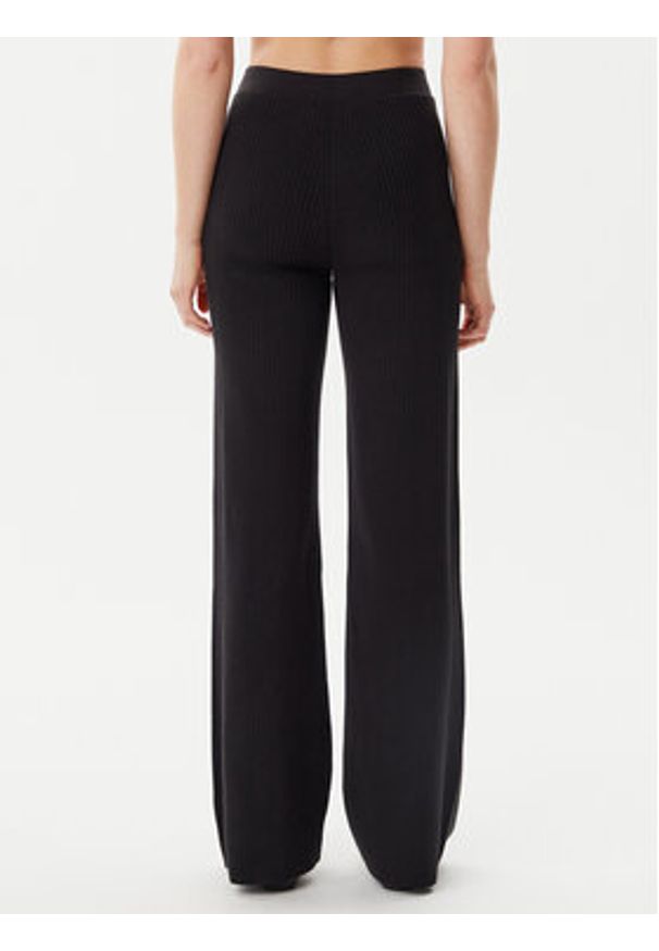 Calvin Klein Jeans Spodnie dzianinowe J20J225336 Czarny Slim Fit. Kolor: czarny. Materiał: bawełna