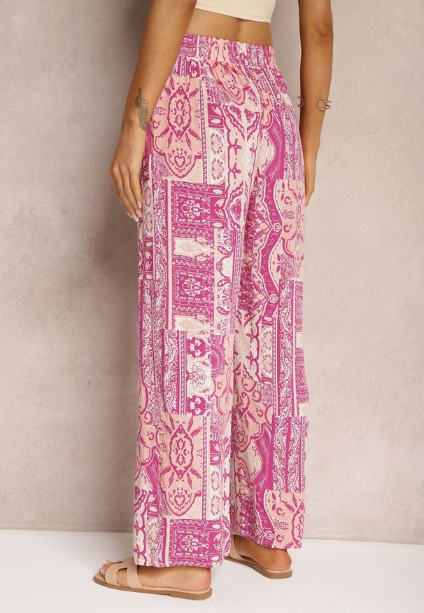 Renee - Różowe Szerokie Spodnie Typu Palazzo z Wiskozy z Gumką w Pasie Melafea. Okazja: do pracy, na spotkanie biznesowe, na imprezę. Kolor: różowy. Materiał: wiskoza. Sezon: lato. Styl: biznesowy, elegancki