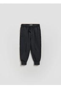 Reserved - Bawełniane joggery - czarny. Kolor: czarny. Materiał: bawełna