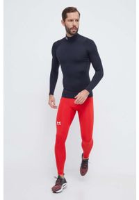 Under Armour legginsy treningowe kolor czerwony gładkie. Kolor: czerwony. Materiał: skóra, materiał. Wzór: gładki