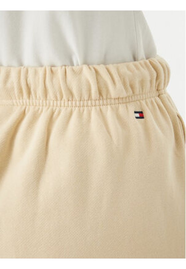 TOMMY HILFIGER - Tommy Hilfiger Spodnie dresowe Logo Embroidery WW0WW49706 Beżowy jasny Regular Fit. Kolor: beżowy. Materiał: bawełna