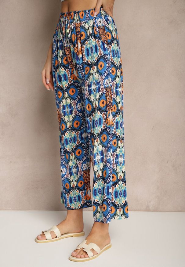 Renee - Niebieskie Bawełniane Spodnie High Waist Szerokie we Wzór Boho Tolioria. Okazja: na co dzień, do pracy. Stan: podwyższony. Kolor: niebieski. Materiał: bawełna. Styl: boho