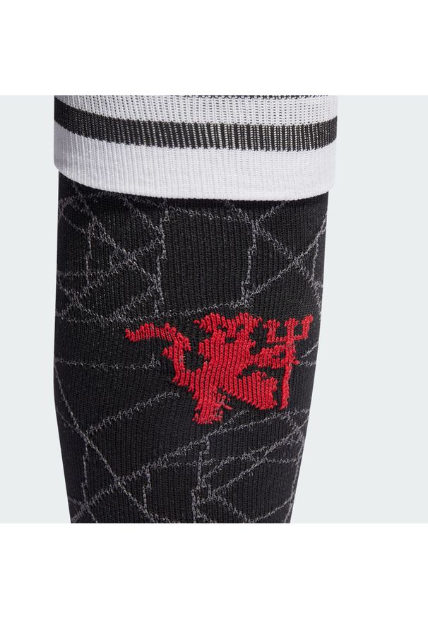 Adidas - Getry Manchester United 23/24 Home. Kolor: czarny. Materiał: materiał. Sport: piłka nożna