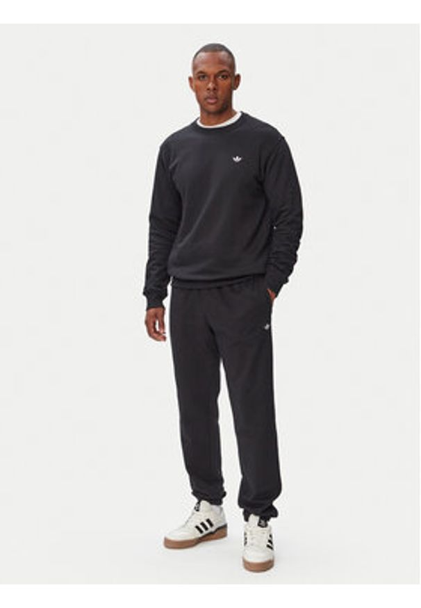 Adidas - adidas Spodnie dresowe Trefoil Essentials KR3463 Czarny Regular Fit. Kolor: czarny. Materiał: bawełna