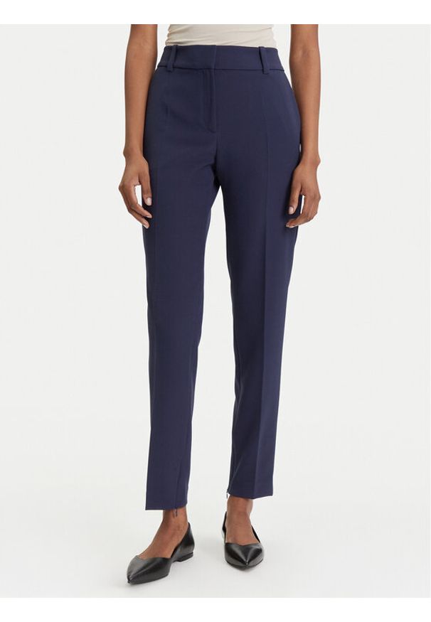 Hugo - HUGO Spodnie materiałowe Hedima-1 50544742 Granatowy Slim Fit. Kolor: niebieski. Materiał: syntetyk