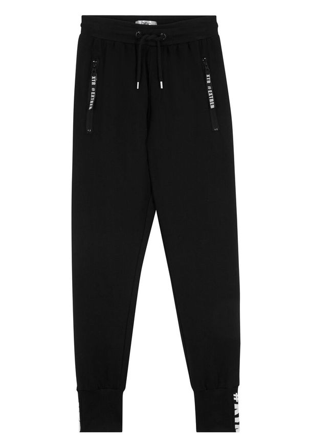 Spodnie dresowe chłopięce z bawełny organicznej bonprix czarny. Kolor: czarny. Materiał: dresówka, bawełna. Styl: sportowy