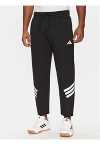 Adidas - adidas Spodnie dresowe Future Icons 3-Stripes JD4889 Czarny Loose Fit. Kolor: czarny. Materiał: syntetyk, bawełna #1