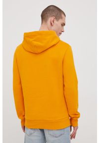 Superdry bluza męska kolor pomarańczowy z kapturem z nadrukiem. Okazja: na co dzień. Typ kołnierza: kaptur. Kolor: pomarańczowy. Wzór: nadruk. Styl: casual