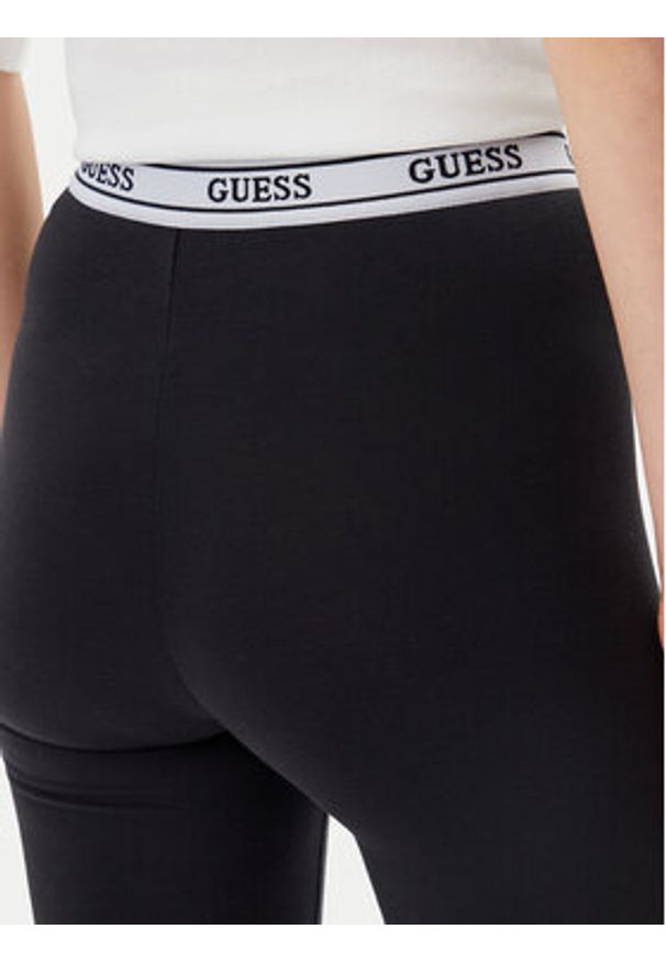 Guess Legginsy V5GB04 KCSA2 Czarny. Kolor: czarny. Materiał: syntetyk, bawełna