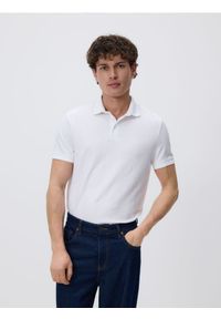 Reserved - Koszulka polo slim - biały. Typ kołnierza: polo. Kolor: biały. Materiał: dzianina, bawełna
