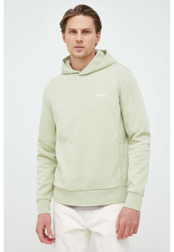 Calvin Klein bluza męska kolor zielony z kapturem gładka. Typ kołnierza: kaptur. Kolor: zielony. Materiał: dzianina. Wzór: gładki