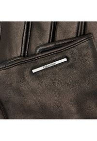 Calvin Klein Rękawiczki Męskie Modern Bar Leather Gloves K50K511017 Czarny. Kolor: czarny. Materiał: skóra