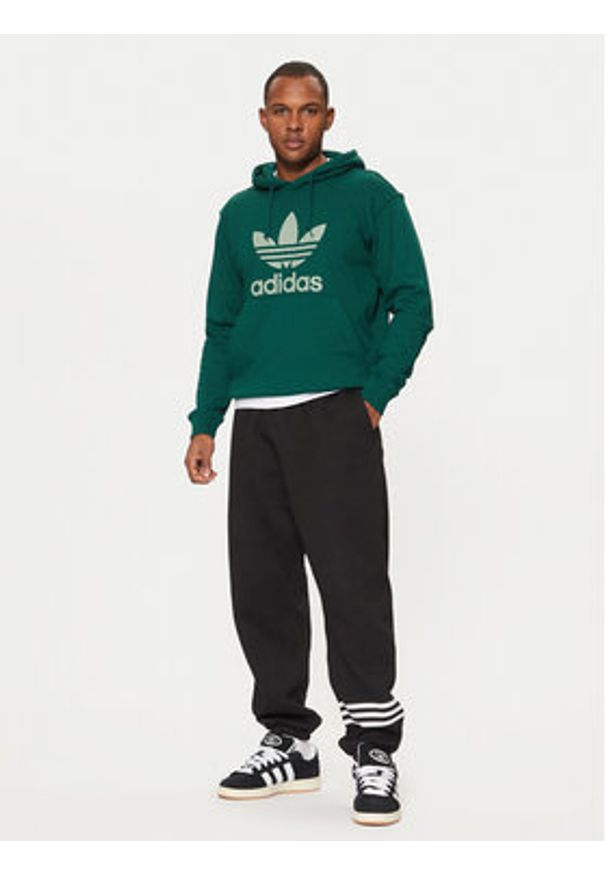 Adidas - adidas Spodnie dresowe Neuclassics JC9903 Czarny Loose Fit. Kolor: czarny. Materiał: bawełna