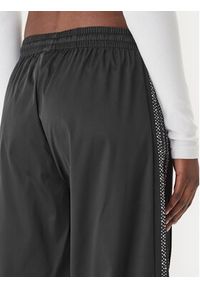 Adidas - adidas Spodnie dresowe Pearl Firebird KC7863 Czarny Loose Fit. Kolor: czarny. Materiał: syntetyk #5
