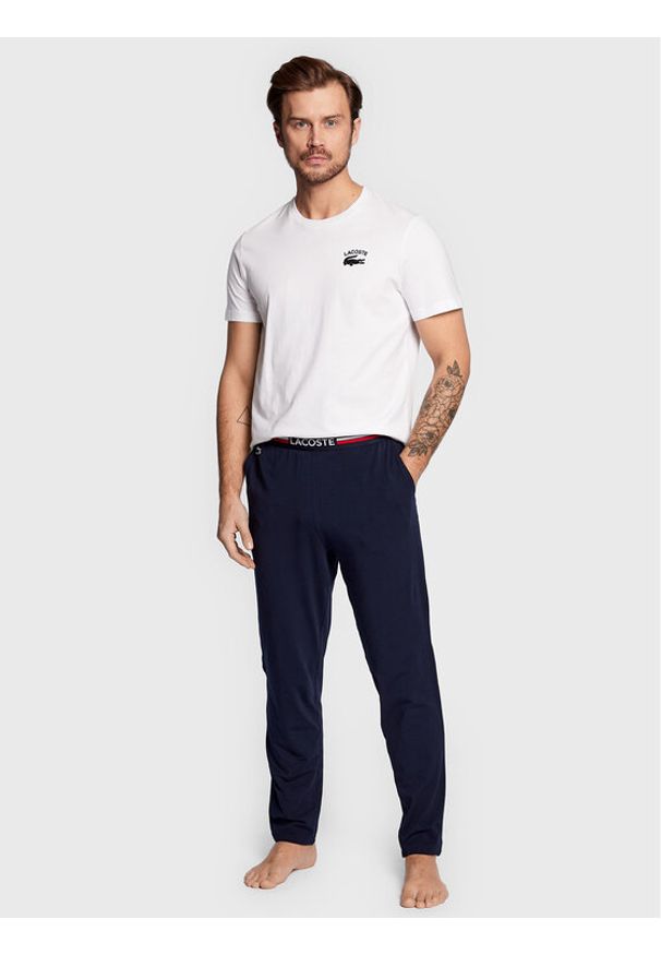 Lacoste Spodnie piżamowe 3H3461 Granatowy Relaxed Fit. Kolor: niebieski. Materiał: bawełna