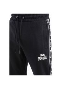 Spodnie dresowe klasyczne Lonsdale Grutness. Kolor: czarny, biały, wielokolorowy. Materiał: dresówka. Długość: długie. Styl: klasyczny #1
