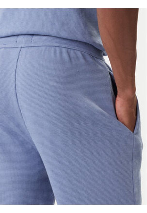 BOSS Spodnie dresowe Waffle 50535878 Błękitny Regular Fit. Kolor: niebieski. Materiał: syntetyk