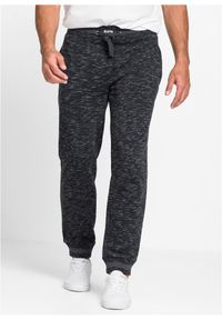 bonprix - Melanżowe spodnie sportowe ze ściągaczem. Kolor: czarny. Wzór: melanż, prążki. Styl: sportowy #1