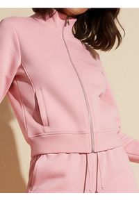 Sinsay - Gładka bluza ze stójką - różowy. Typ kołnierza: kołnierzyk stójkowy. Kolor: różowy. Wzór: gładki #1