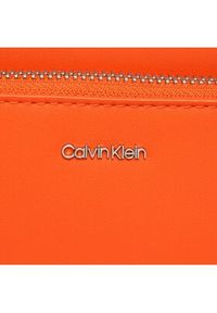 Calvin Klein Torebka Ck Must Camera Bag W/Pckt Lg K60K608410 Pomarańczowy. Kolor: pomarańczowy. Materiał: skórzane
