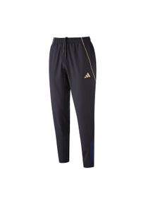 Adidas - Spodnie dresowe Prematch OL 2025/26. Kolor: czarny. Materiał: dresówka. Sport: piłka nożna