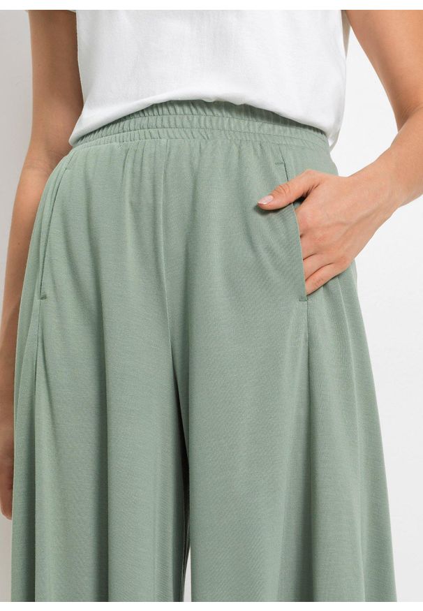 bonprix - Spodnie culotte z dżerseju, z szerokimi nogawkami. Kolor: zielony. Materiał: jersey