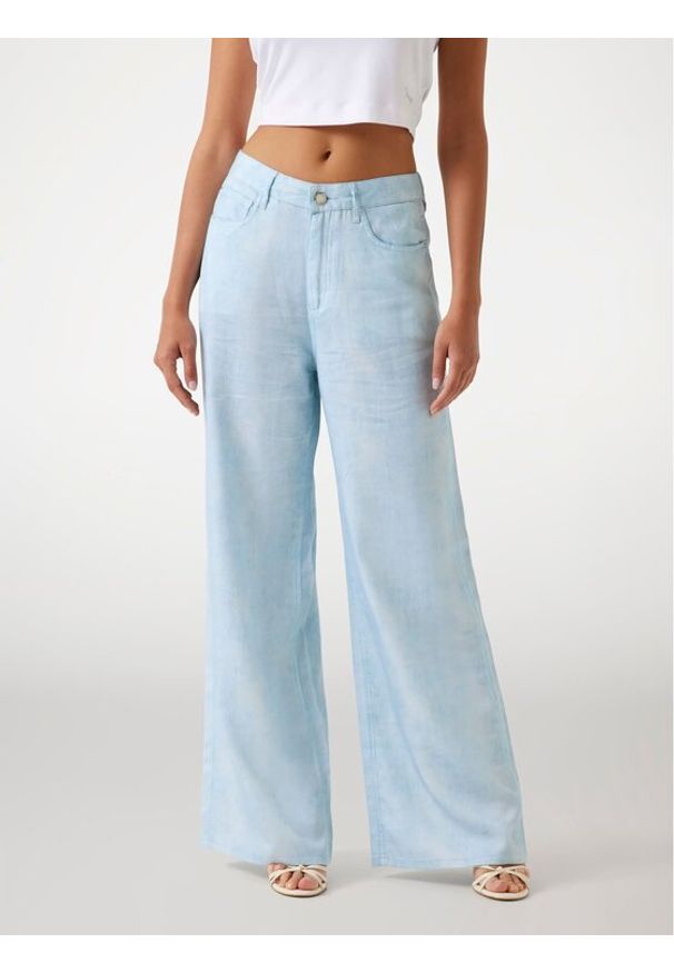 Guess Spodnie materiałowe 176485 Niebieski Slim Fit. Kolor: niebieski. Materiał: syntetyk