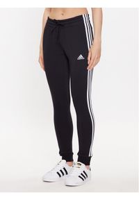 Adidas - adidas Spodnie dresowe HZ5753 Czarny Slim Fit. Kolor: czarny. Materiał: bawełna #1