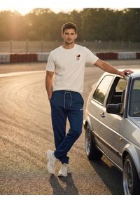 Sinsay - Spodnie dresowe jogger - niebieski. Kolor: niebieski. Materiał: dresówka